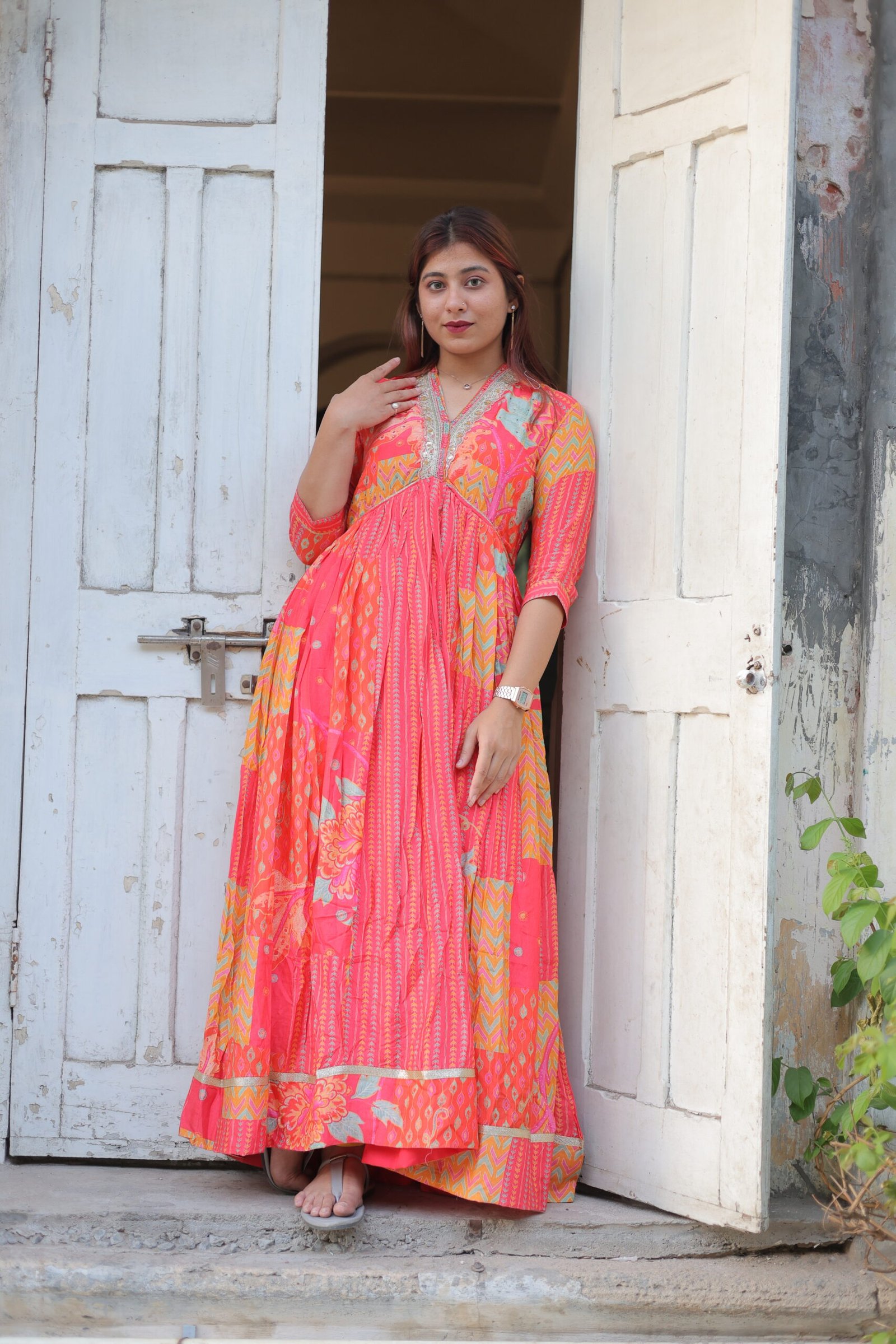 Orange One piece with Hand Work Yoke.